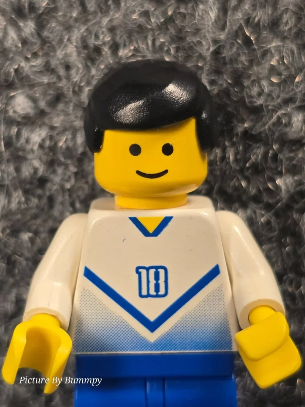LEGO minifigure is a soccer player from the 2002 Sports